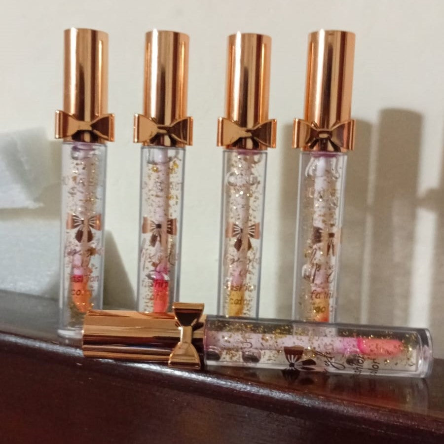Luxury Pink Glossy Lip Oil With Gold Flakes High Shine
